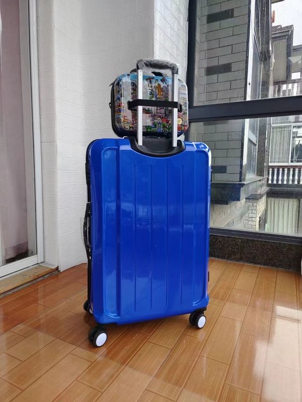Kualitas tinggi China Pabrik Berwarna-warni Desain Baru Hard Shell Waterproof Gift Set Abs Grosir Koper Zipper Waktu Perjalanan